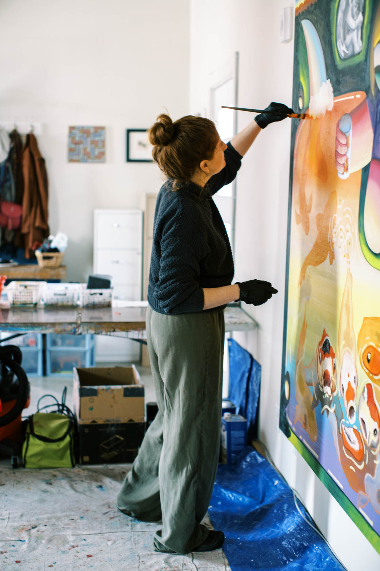 Editorial photos of an artist working in her studio