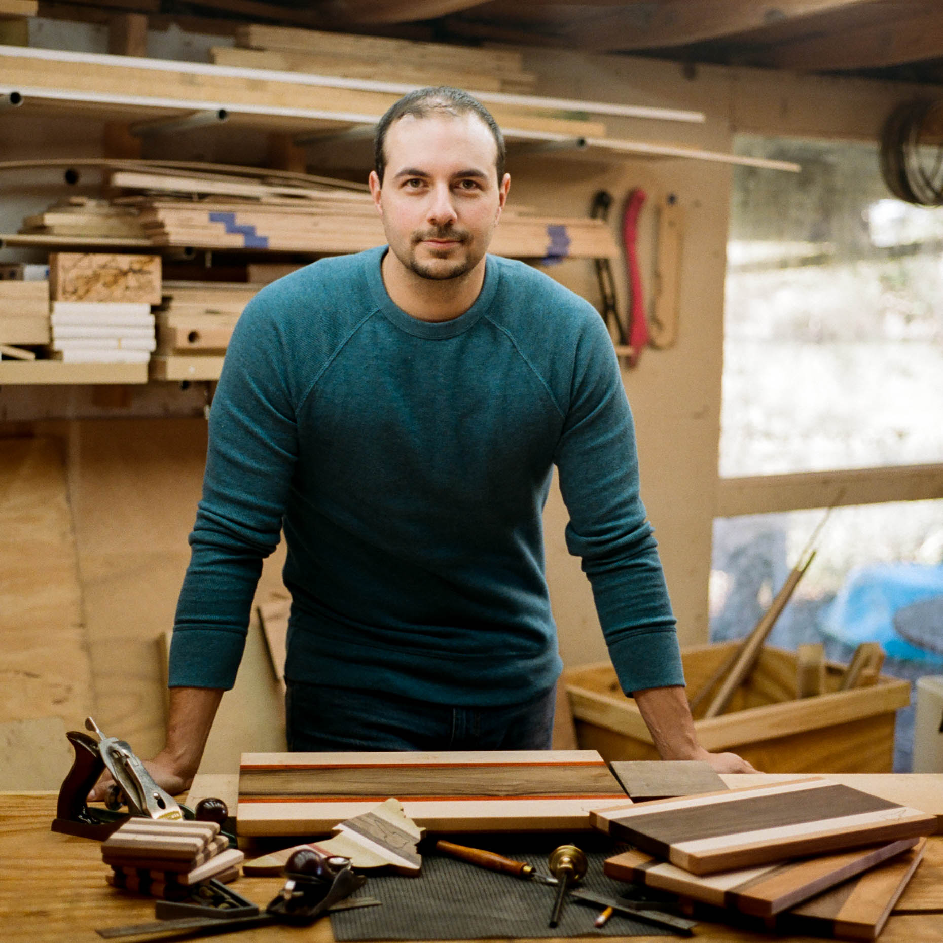 portraits of an artisan woodworker in his shop