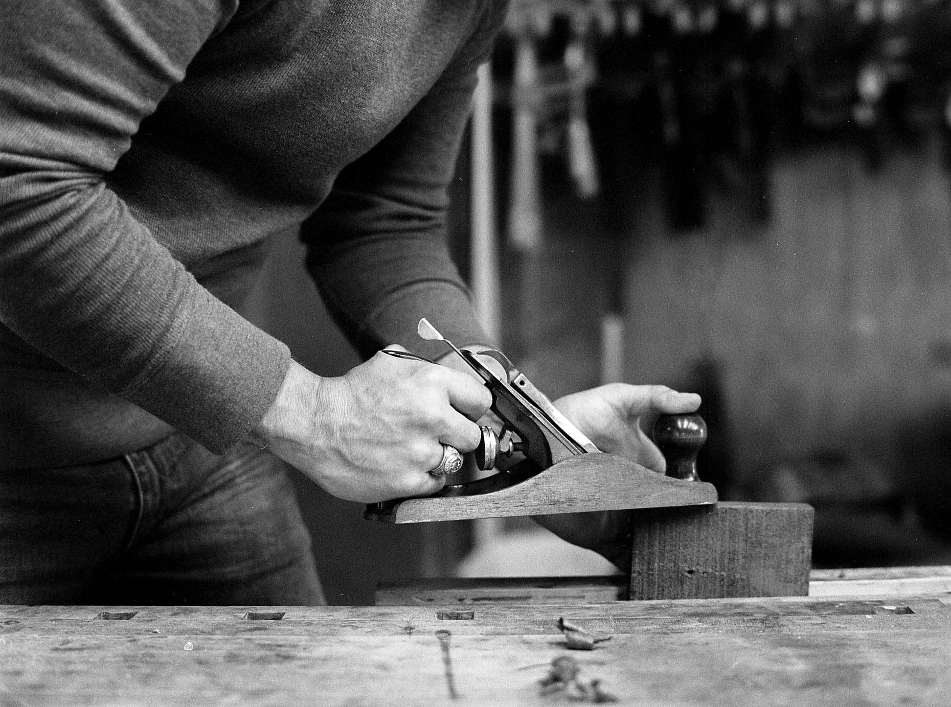 editorial photos of a wood worker making artisan products